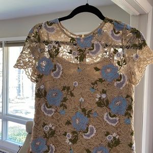 Knee length lace dress, beige with blue flowers
